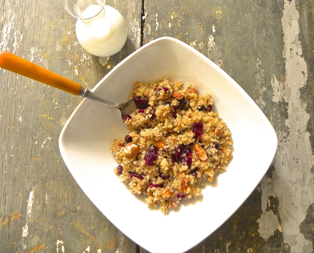 breakfast quinoa with toasted almonds, cranberries and chia seeds