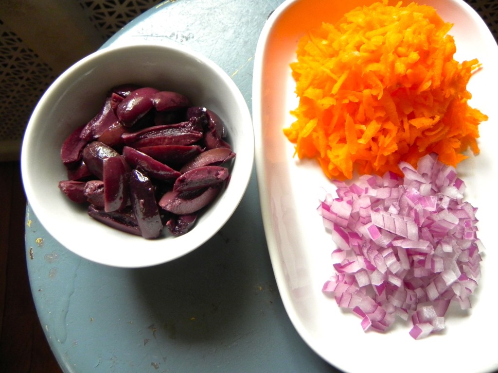 black olives and red onion for bean salad