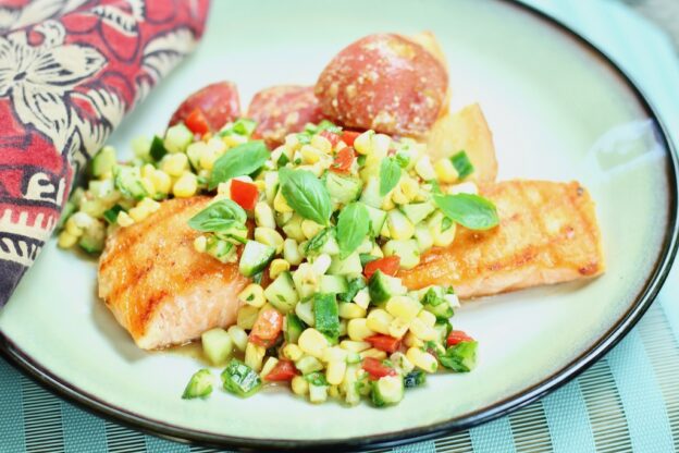 plate of salmo with cucunber corn salsa