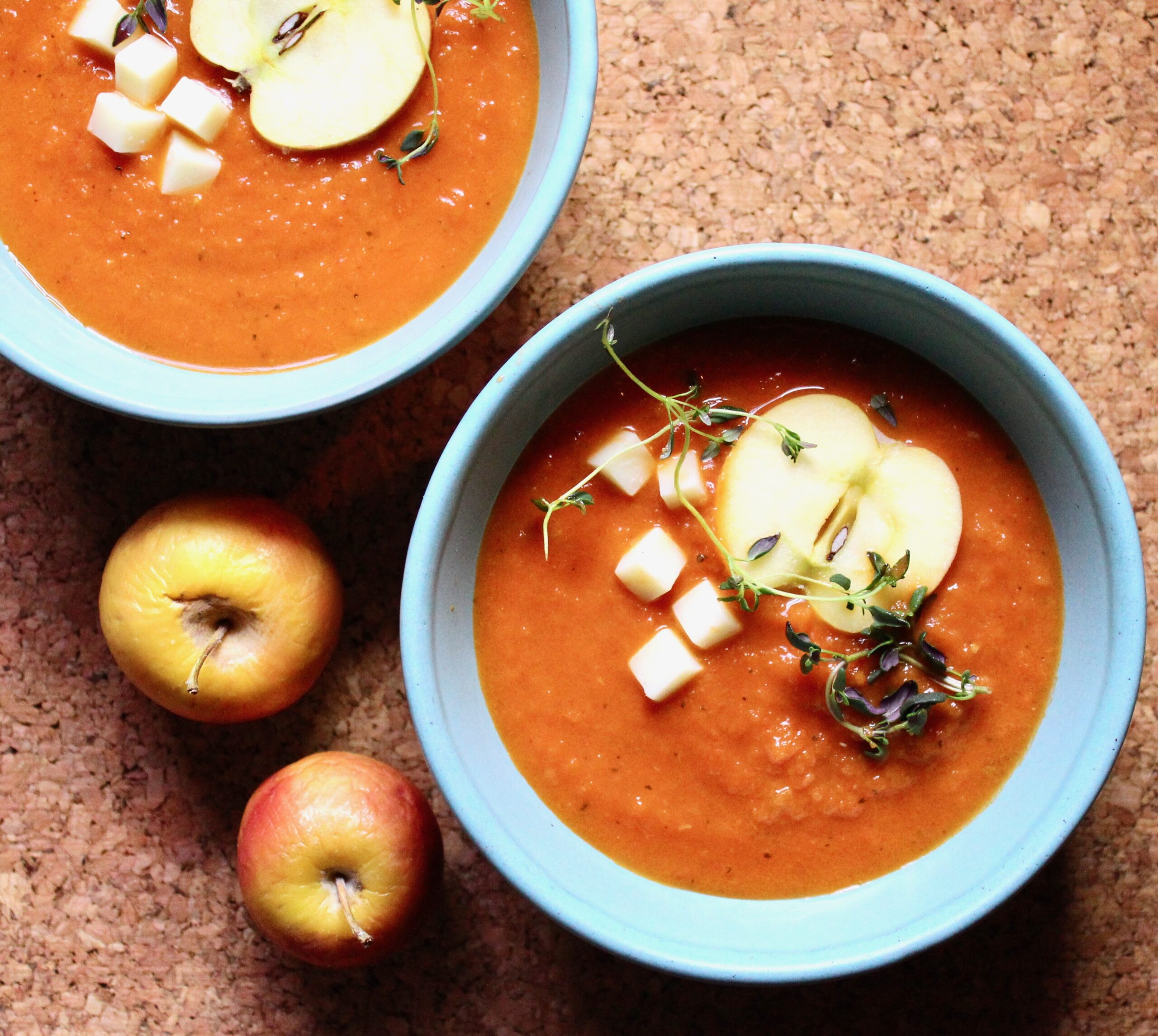 bowls of tomato apple soup