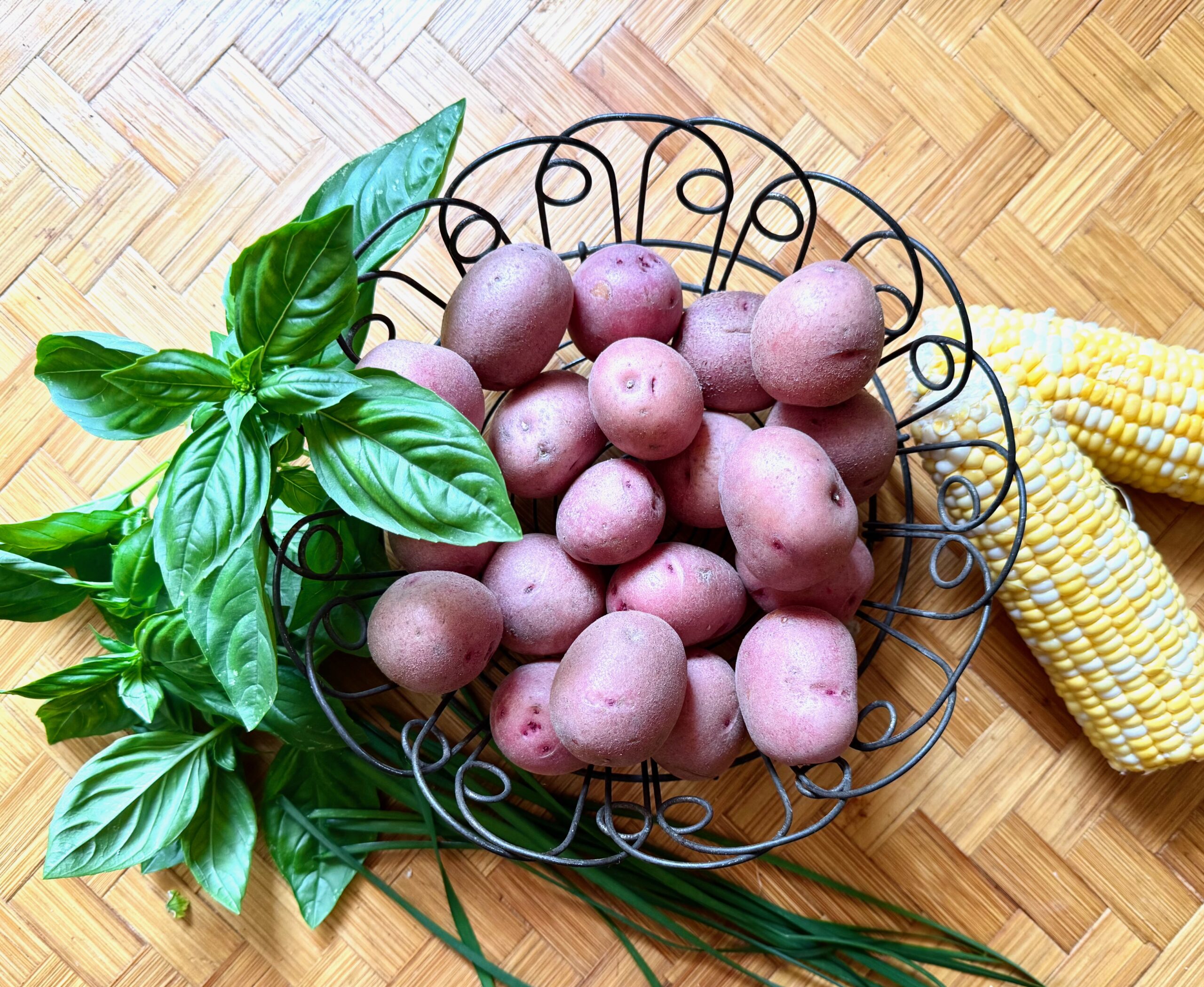 ingredients for herbed corn potato salad